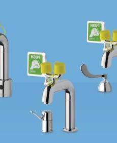 manual and touchless emergency eyewash faucets on blue background